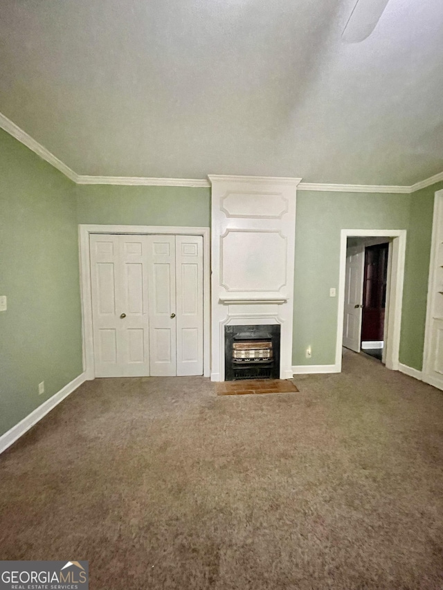 unfurnished living room with dark carpet and ornamental molding