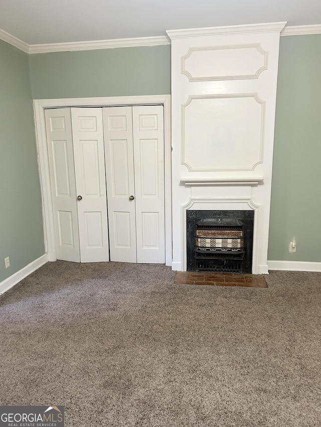 unfurnished living room with crown molding and dark carpet