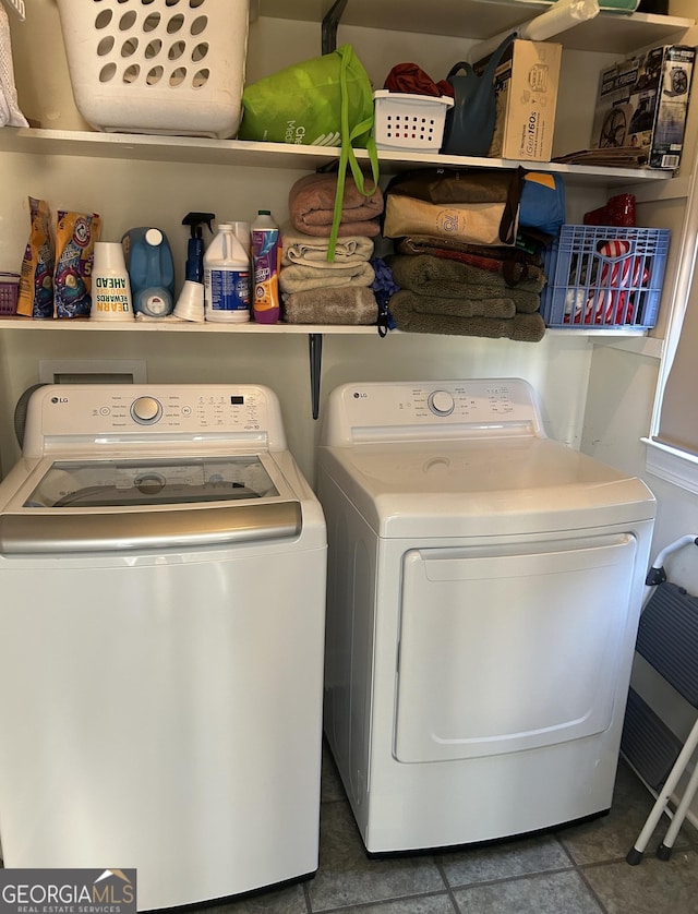 clothes washing area featuring washing machine and dryer