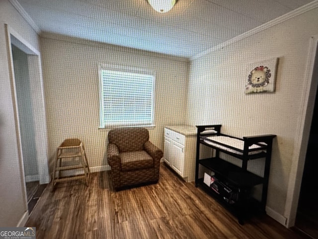 5859 8th Ave, Eastman, GA 31023 - sitting room with crown molding, dark wood-style floors, and baseboards