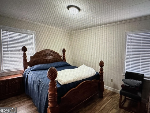 5859 8th Ave, Eastman, GA 31023 - bedroom with wood finished floors and baseboards