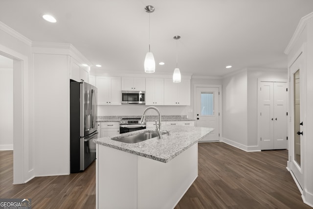 kitchen featuring dark hardwood / wood-style floors, hanging light fixtures, stainless steel appliances, sink, and white cabinets