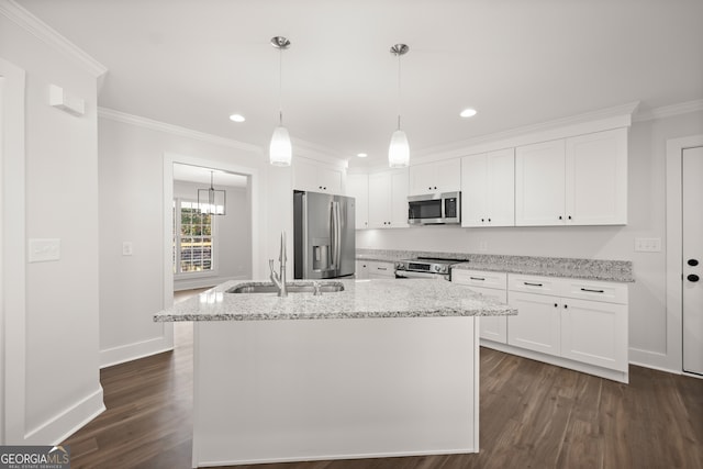 kitchen with a kitchen island with sink, stainless steel appliances, sink, white cabinets, and dark hardwood / wood-style flooring