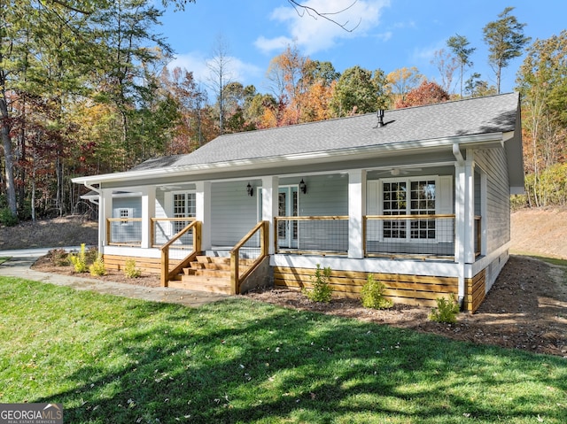 view of front of house with a front lawn and a porch