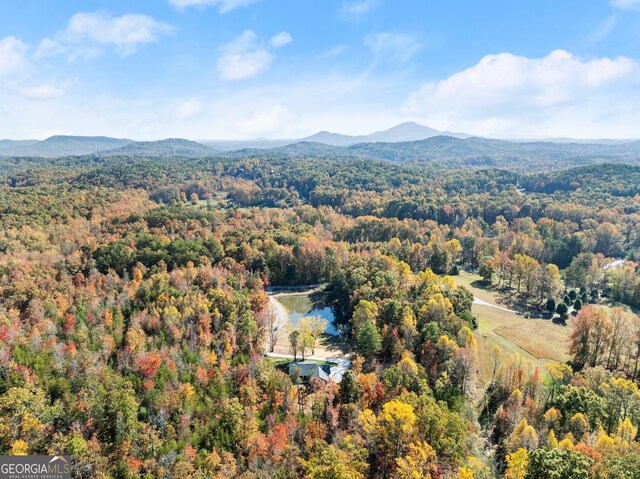 aerial view featuring a water and mountain view