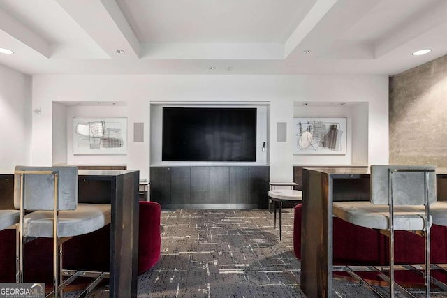 living room with a tray ceiling