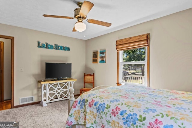 bedroom with carpet floors and ceiling fan