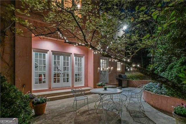 view of patio with grilling area and french doors