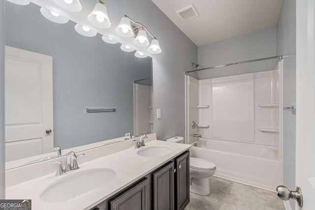 full bathroom featuring vanity, toilet, and shower / bath combination