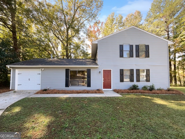 view of front facade featuring a front yard and a garage