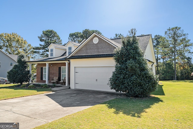 view of front of house with a garage and a front lawn