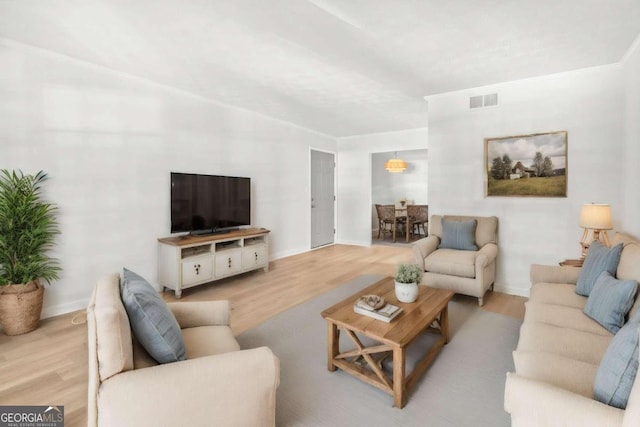 living room featuring light wood-type flooring