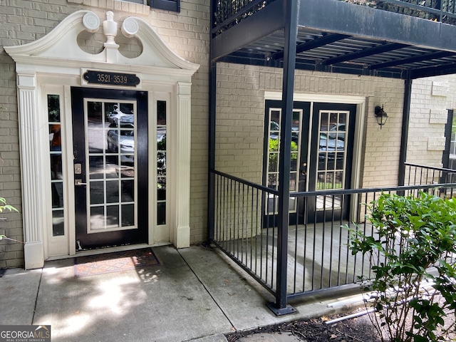 entrance to property featuring french doors