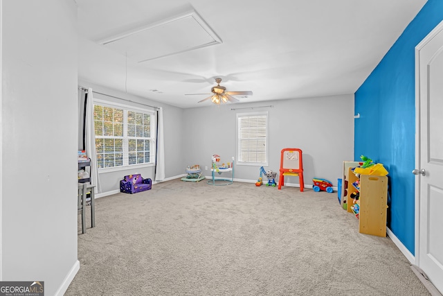 playroom featuring carpet flooring and ceiling fan