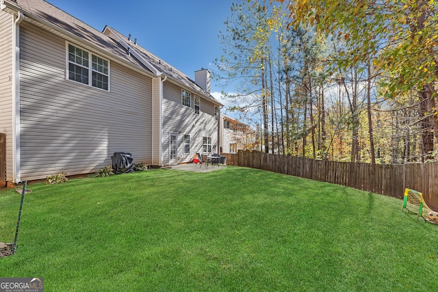 view of yard with a patio area