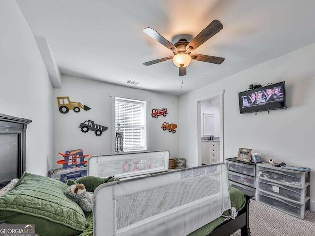 carpeted bedroom featuring ceiling fan