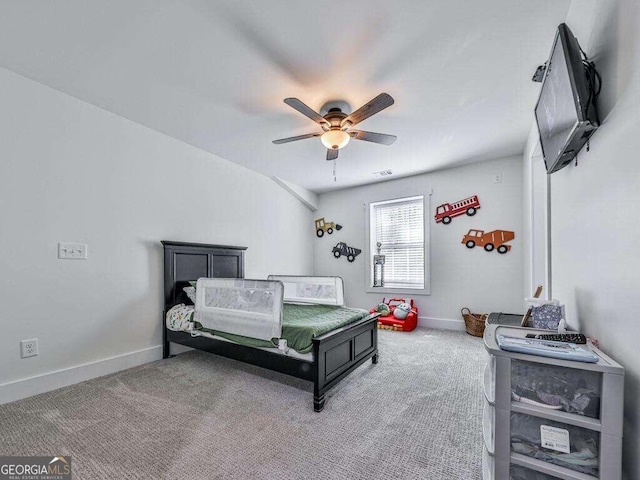 carpeted bedroom with ceiling fan