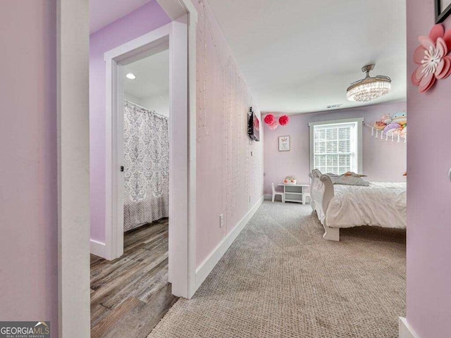 bedroom featuring hardwood / wood-style flooring