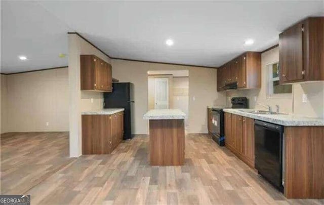 kitchen with black appliances, a center island, light hardwood / wood-style floors, lofted ceiling, and ventilation hood