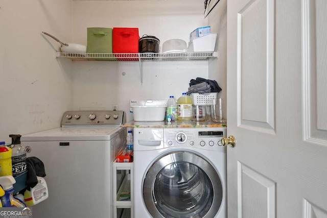 laundry room featuring independent washer and dryer