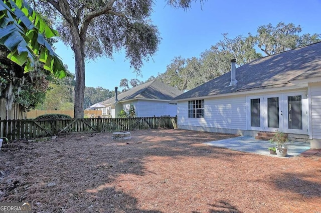 back of house featuring french doors and a patio