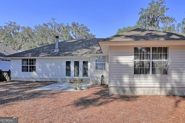 rear view of house with a patio