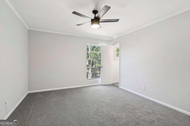 unfurnished room featuring crown molding, carpet floors, and ceiling fan