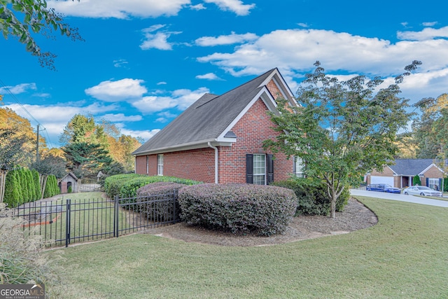 view of home's exterior with a lawn