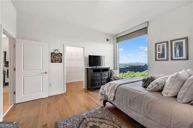 bedroom featuring hardwood / wood-style floors