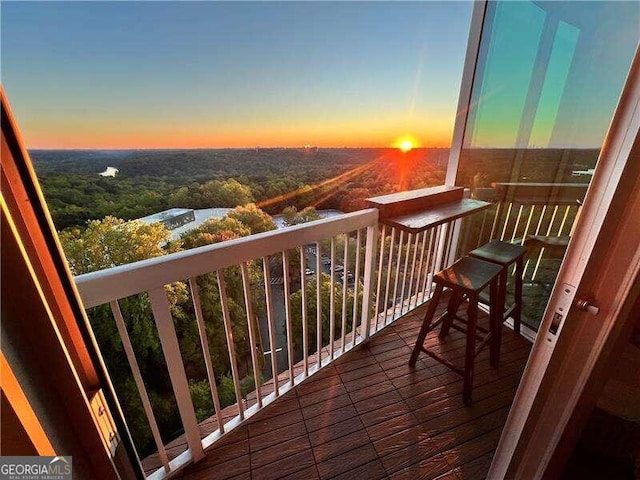 view of balcony at dusk