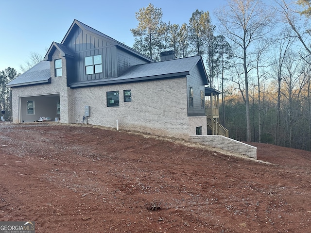 view of home's exterior with a garage