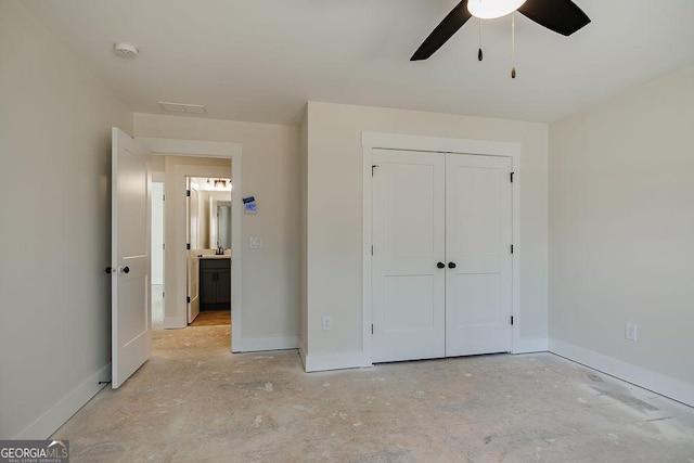 unfurnished bedroom with a closet and ceiling fan