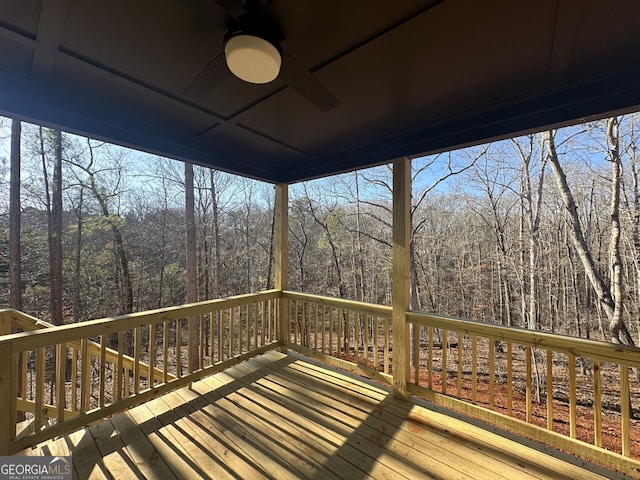 wooden deck with ceiling fan