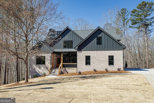 modern farmhouse with a porch