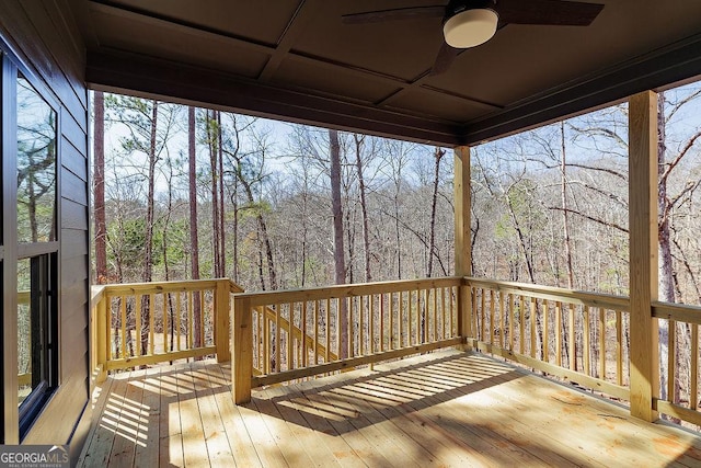 wooden terrace with ceiling fan