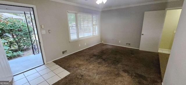 interior space featuring ornamental molding and ceiling fan