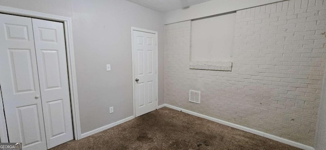 unfurnished bedroom featuring carpet floors