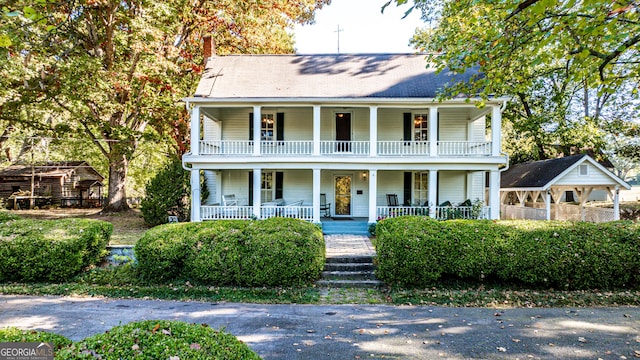 164 Manning Gin Rd, Bethlehem, GA 30620 - view of front facade featuring covered porch and a chimney