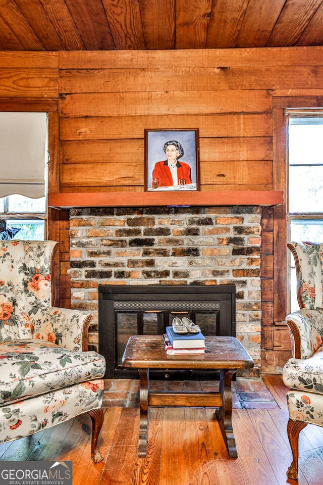 164 Manning Gin Rd, Bethlehem, GA 30620 - detailed view of a fireplace, wood ceiling, wooden walls, and wood finished floors