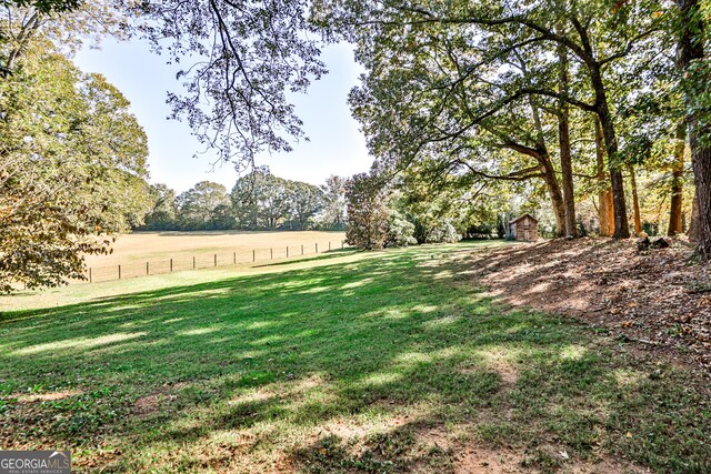164 Manning Gin Rd, Bethlehem, GA 30620 - view of yard featuring a storage shed and a view of rural / pastoral area