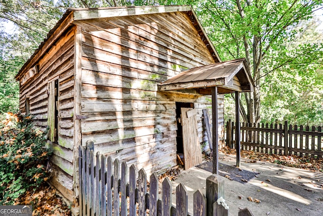 exterior space with a storage shed