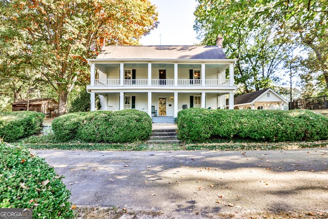 164 Manning Gin Rd, Bethlehem, GA 30620 - view of front of home with covered porch and a chimney