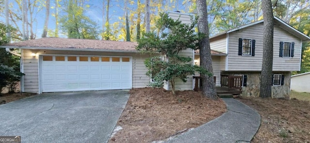 split level home featuring a garage