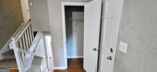 stairway featuring hardwood / wood-style floors