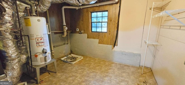 utility room with gas water heater