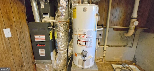 utility room with gas water heater