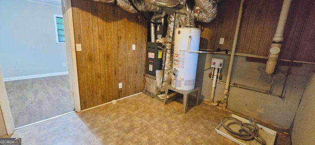 utility room featuring gas water heater