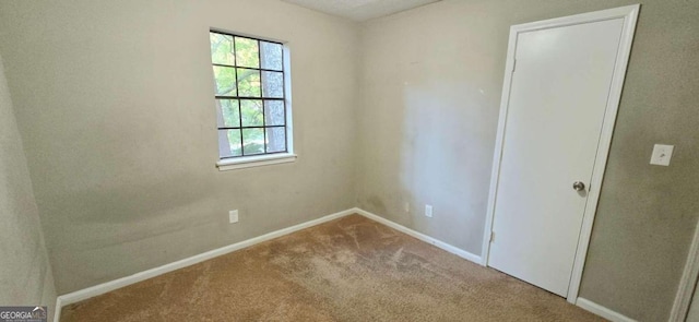 view of carpeted spare room