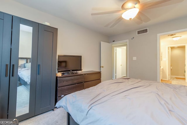 carpeted bedroom with ceiling fan