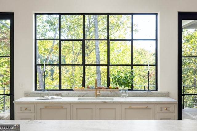 bathroom featuring sink and plenty of natural light